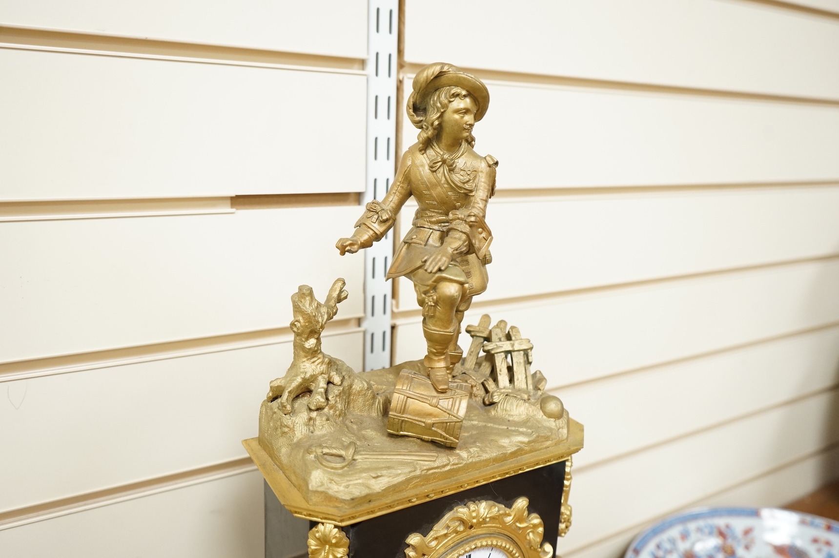 A 19th century French gilt metal mantel clock and stand, 56cm total